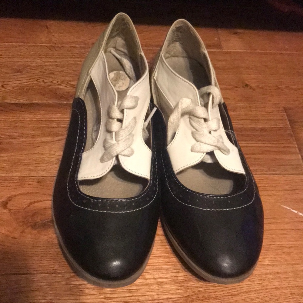 Black, white and beige loafers